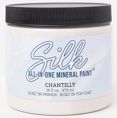 Chantilly is the fourth shade in our Countryside Collection, inspired by delicate wildflowers and vintage linens. This soft, warm white brings a light, inviting ambiance to any space and complements both vibrant accents and natural wood finishes. Part of the Silk All-In-One Mineral Paint range, Chantilly includes primer, paint, and topcoat in one. Its low VOC, water-based formula ensures easy cleanup and makes it ideal for professional and DIY applications alike.
