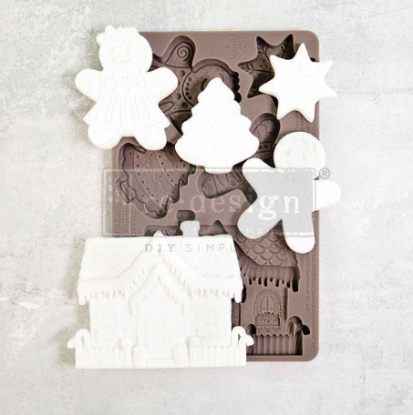 REDESIGN DÉCOR MOULDS® 5″X 8″ – FESTIVE GINGERBREAD TREATS

The Festive Gingerbread Treats Décor Mould® by Redesign With Prima measures 5" x 8" and captures classic holiday motifs including gingerbread people, a miniature gingerbread house, and a star-shaped cookie.

Breathe new life into your furniture, walls, and more with our redesign decor moulds. Our heat resistant moulds offer endless creativity with unique &amp; detailed pieces. Use them with paper clay, ceramic clay, resin, candy/chocolate and more.
