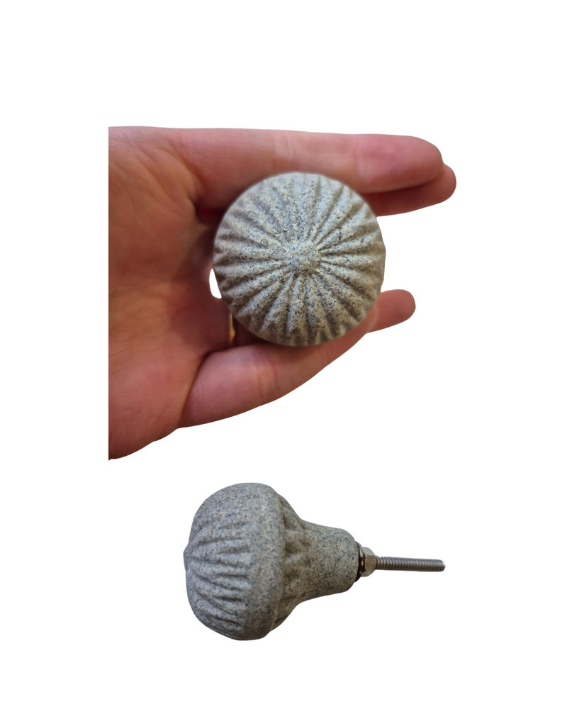 GREY PATTERNED
Set of 3
Drawer knob

Each Knob is ~4cm wide 4cm deep.

Screw thread length 3.54cm

These grey ceramic door knobs offer a subtle yet sophisticated touch to any space. Featuring an intricate patterned effect, they combine timeless elegance with modern design. The cool finish of the grey concrete-like ceramic contrasts beautifully with the textured detailing, making these knobs a perfect blend of style and function. Ideal for adding a refined, understated accent to doors in both contemporary an