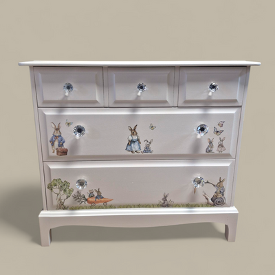 Stag Minstrel Chest of Drawers- Medium

Stag furniture is renowned for its exceptional quality. The Minstrel range is made from African Cherry.

It has been painted with Fusion Mineral Paint in Cashmere and finished&nbsp;with Fusion Ultra Guard in Flat. It has been accented with the Redesign with Prima Transfer 'Bunny Trails'

Dimensions

Depth 46cm

Width 82cm

Height 71cm