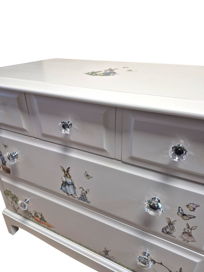 Stag Minstrel Chest of Drawers- Medium

Stag furniture is renowned for its exceptional quality. The Minstrel range is made from African Cherry.

It has been painted with Fusion Mineral Paint in Cashmere and finished&nbsp;with Fusion Ultra Guard in Flat. It has been accented with the Redesign with Prima Transfer 'Bunny Trails'

Dimensions

Depth 46cm

Width 82cm

Height 71cm