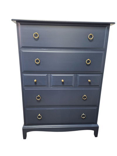 Stag Minstrel Tallboy | Midnight Blue

1X Tallboy

Stag furniture is renowned for its exceptional quality. The Minstrel range is made from African Cherry.

This set of 3 drawers have been professionally painted with Fusion Mineral Paint in Midnight Blue and finished with Fusion Ultra Guard in Flat. It boasts it's original hardware and is in good, solid condition. We have undertaken some repairs including, new drawer runners and plywood backing.&nbsp;

Dimensions